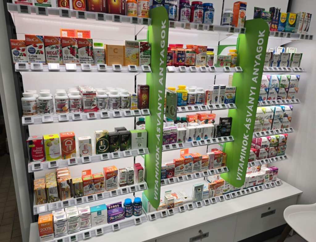 Electronic shelf labels for retail pharmacy shelving, fitted to every shelf edge